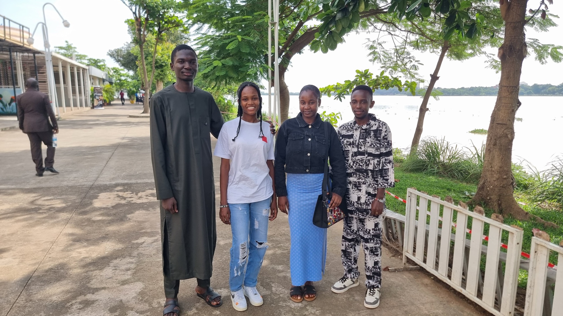 The four Charisma Tumaini university scholars together beside Jabi Lake in Abuja, Nigeria